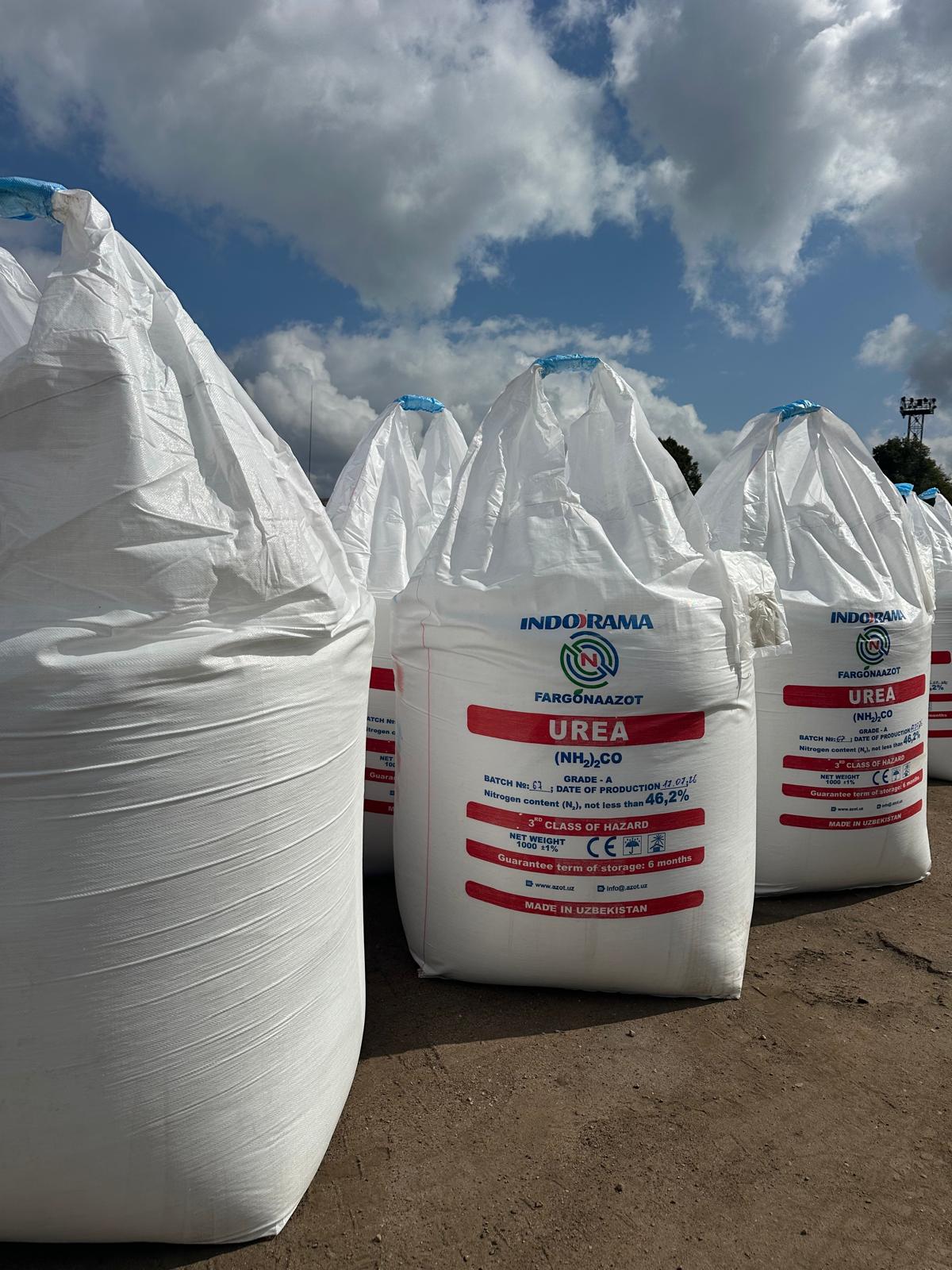 Rows of Indorama Fargonaazot Urea big bags outdoors under a blue sky